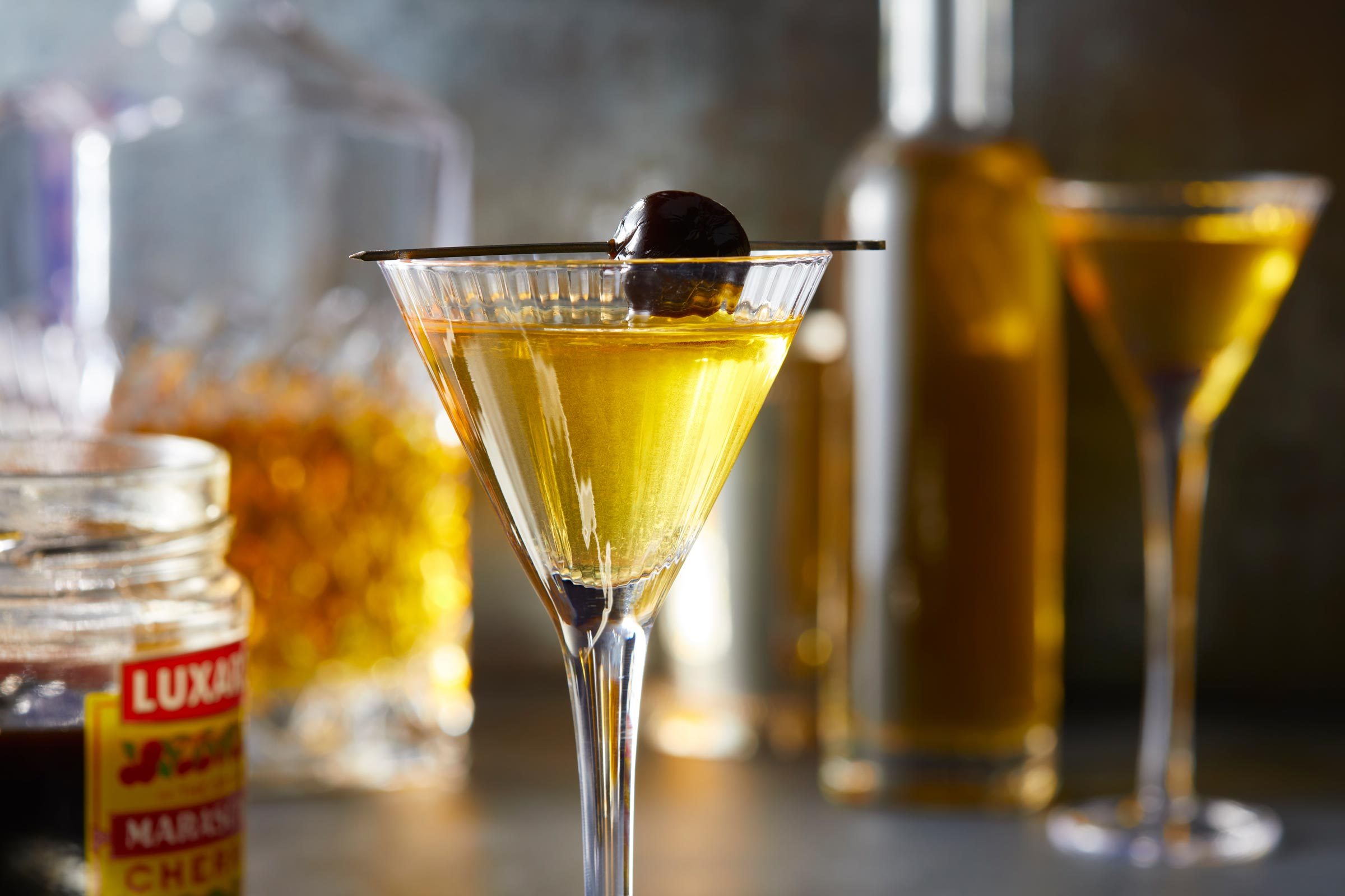 cocktail with a cherry made with Grand Marnier Recipe