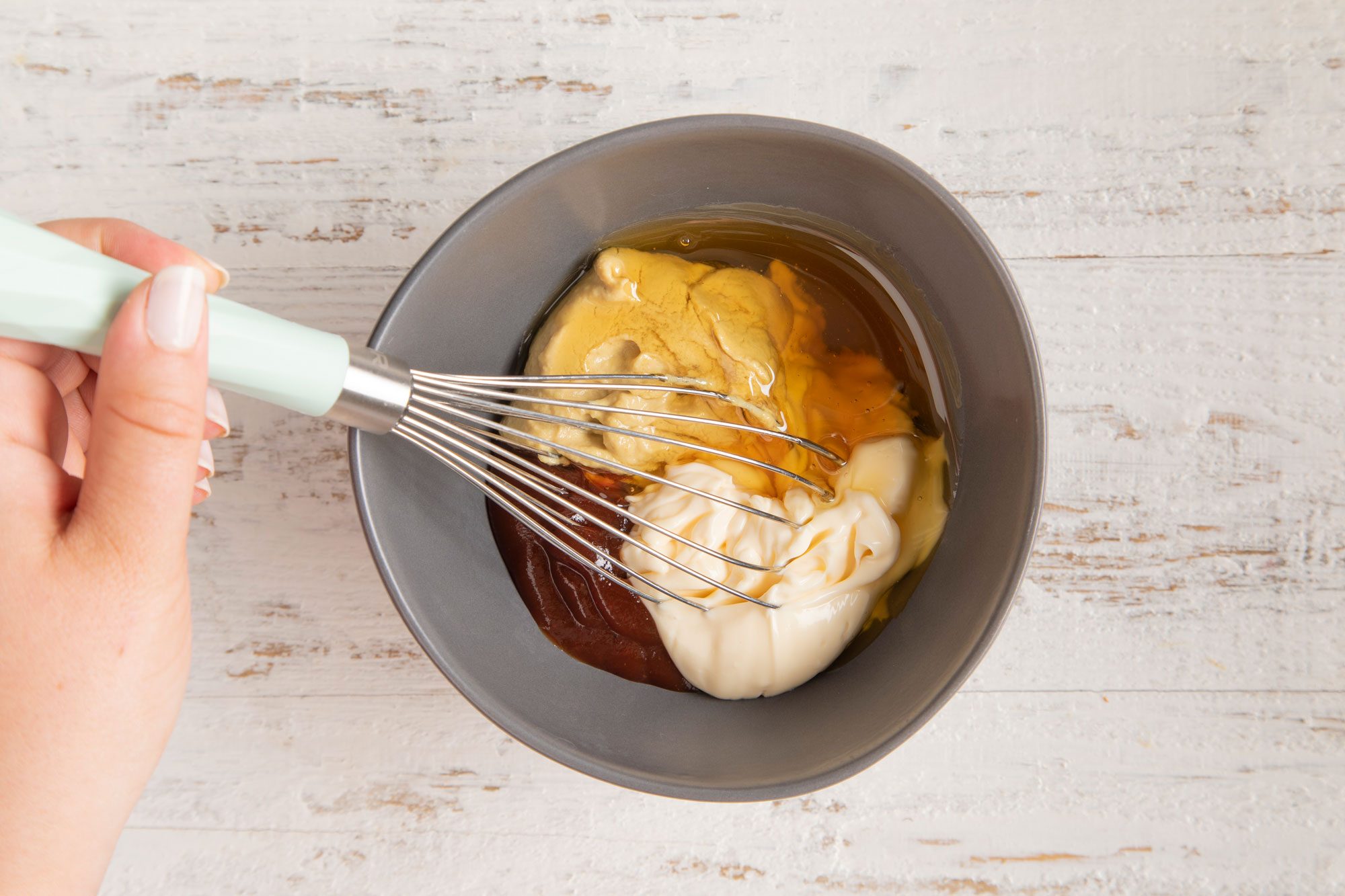 Combine the mustard, mayonnaise, barbecue sauce and honey