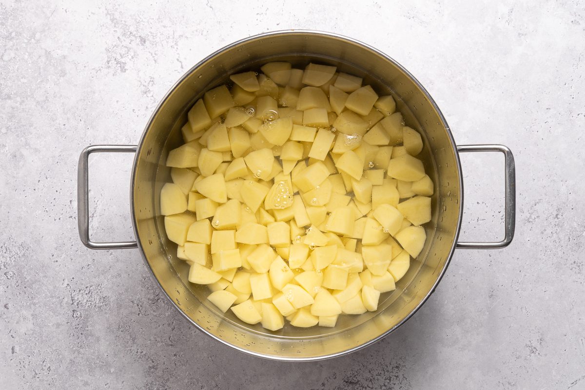 Chopped Potatoes Inside Pot With Water